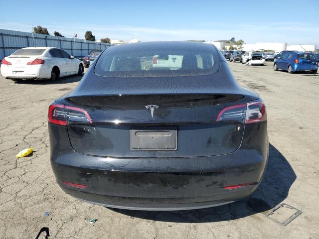5YJ3E1EA1MF076792 Tesla 2021