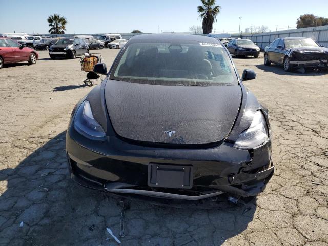 5YJ3E1EA1MF076792 Tesla 2021