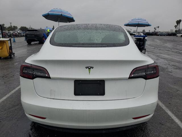 5YJ3E1EA5MF996201 Tesla 2021