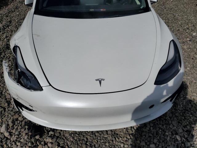 5YJ3E1EC1NF243316 Tesla 2022