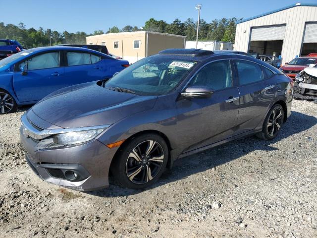 Auction sale of the 2017 Honda Civic Touring, vin: 2HGFC1F92HH649532, lot number: 52518104