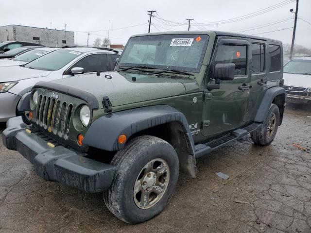 Auction sale of the 2009 Jeep Wrangler Unlimited X, vin: 1J4GZ39169L733869, lot number: 49288864