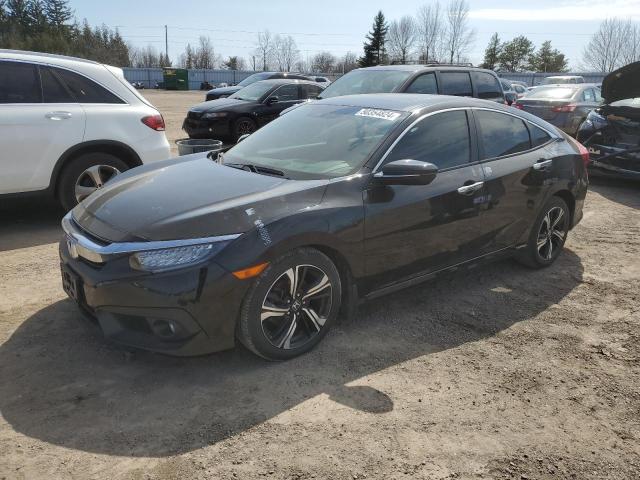 Auction sale of the 2018 Honda Civic Touring, vin: 2HGFC1F94JH108326, lot number: 50354824