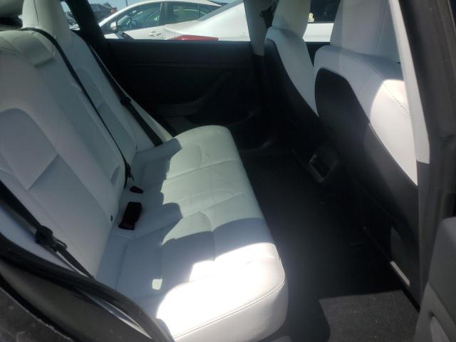 5YJ3E1EA4PF713565 Tesla 2023