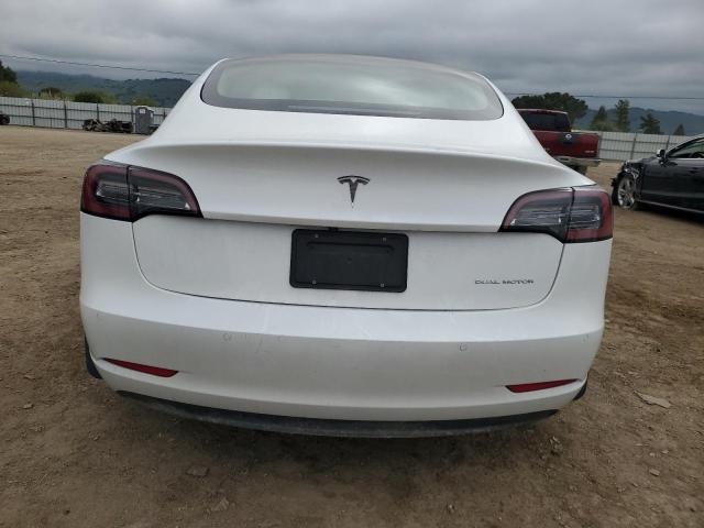 5YJ3E1EB0MF073052 Tesla 2021