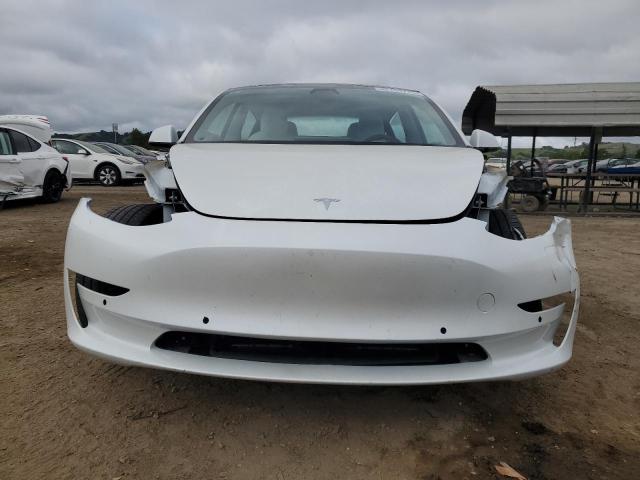 5YJ3E1EB0MF073052 Tesla 2021