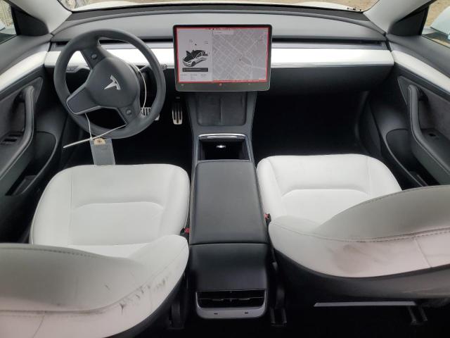 5YJ3E1EB0MF073052 Tesla 2021