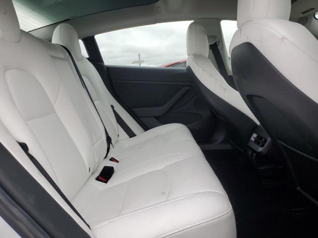 5YJ3E1EB0MF073052 Tesla 2021