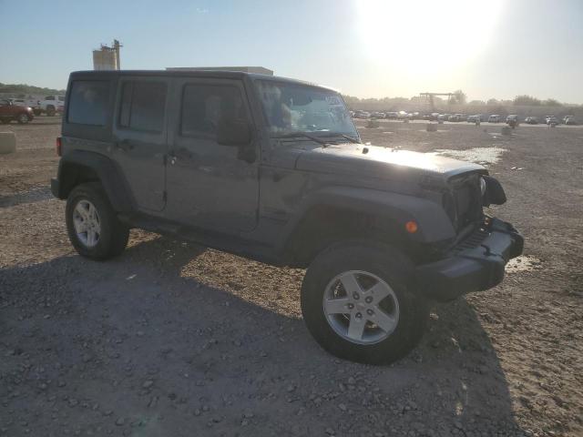 1C4BJWDG8EL156308 Jeep Wrangler Unlimited Sport