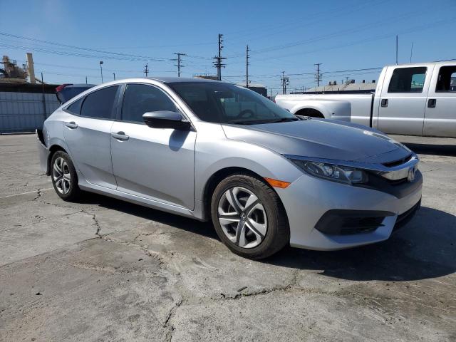 2HGFC2F57GH519702 Honda Civic Lx