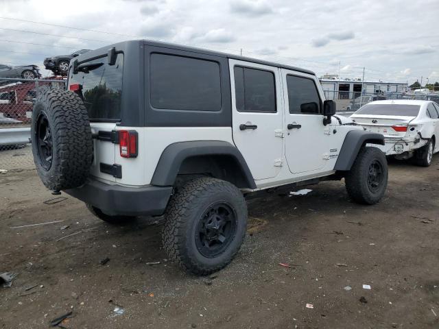 1C4BJWDG5EL312126 Jeep Wrangler Unlimited Sport