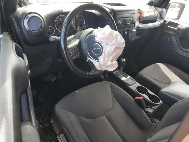 1C4HJWDG3EL231880 Jeep Wrangler Unlimited Sport