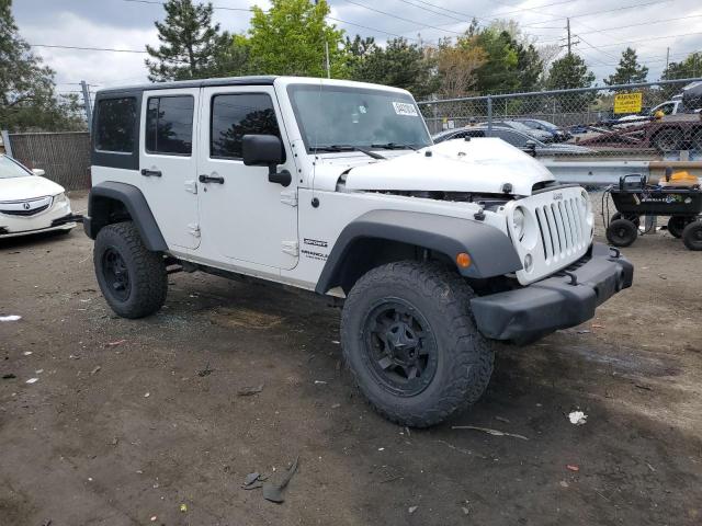 1C4BJWDG5EL312126 Jeep Wrangler Unlimited Sport