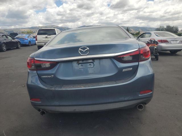 JM1GJ1V51G1473142 Mazda py