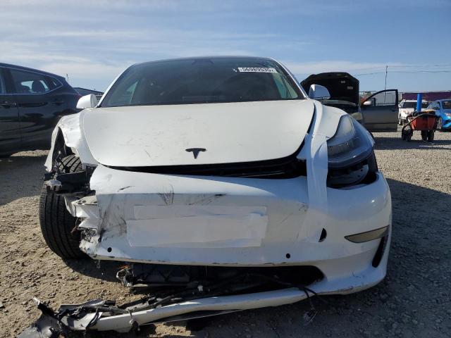 5YJ3E1EA7LF590791 Tesla 2020
