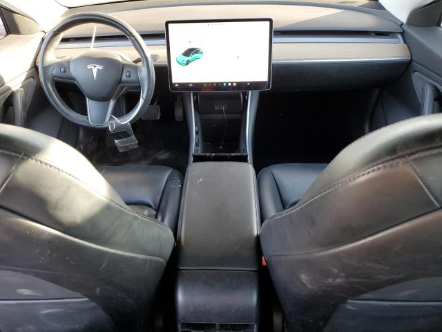 5YJ3E1EA4KF298143 Tesla 2019