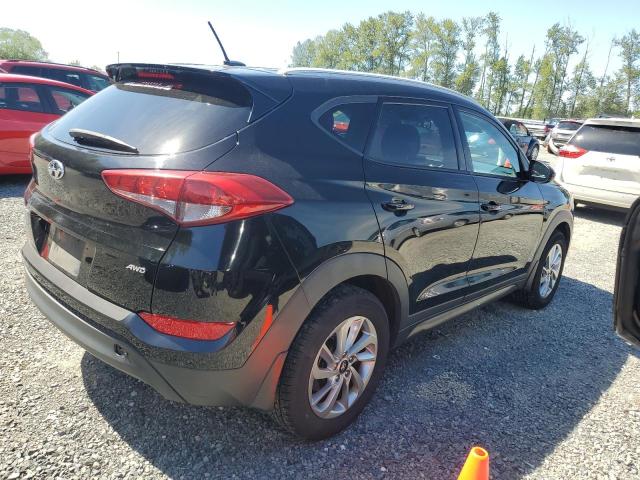 KM8J3CA42GU128382 Hyundai Tucson