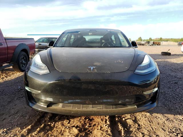 5YJ3E1EA4KF298143 Tesla 2019