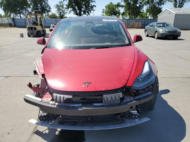 5YJ3E1EB9NF195412 Tesla 2022