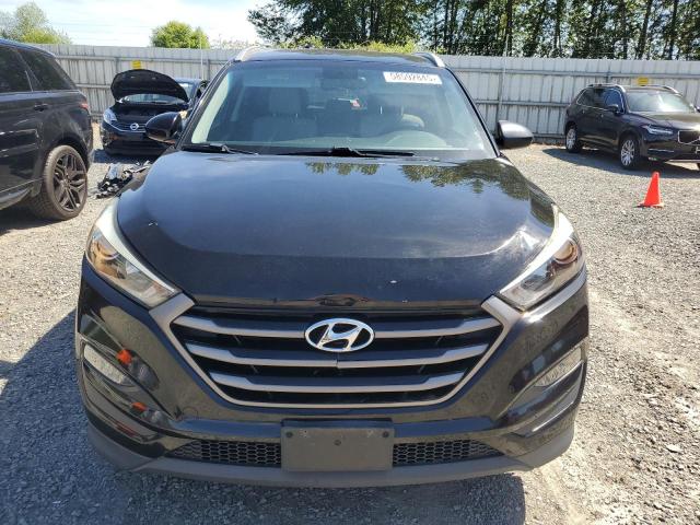 KM8J3CA42GU128382 Hyundai Tucson