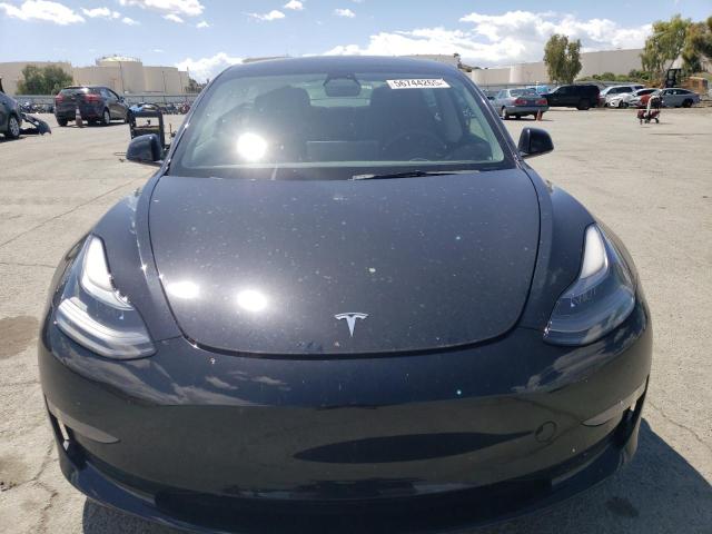 5YJ3E1EA7NF301895 Tesla 2022