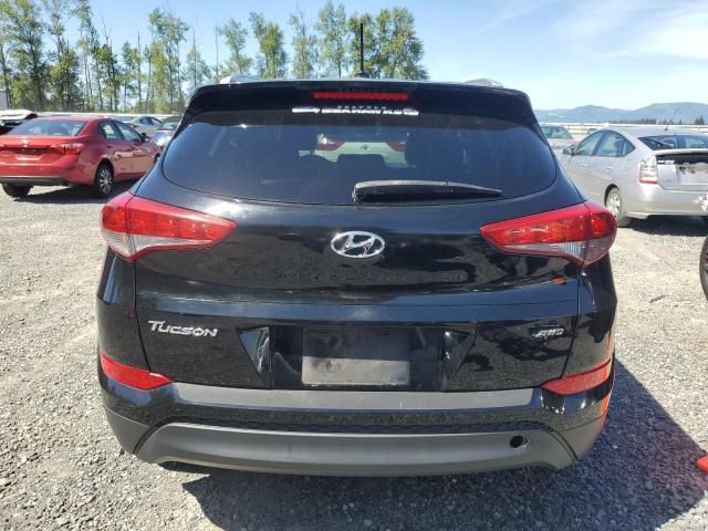 KM8J3CA42GU128382 Hyundai Tucson