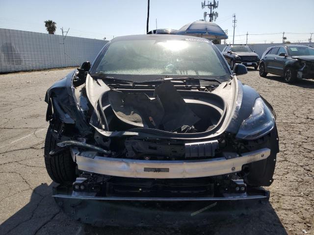 5YJ3E1EB5NF209676 Tesla 2022