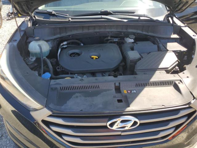 KM8J3CA42GU128382 Hyundai Tucson