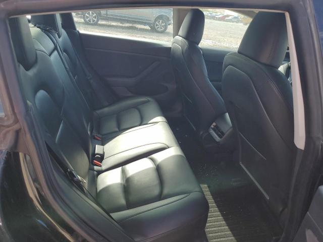5YJ3E1EAXPF708001 Tesla 2023