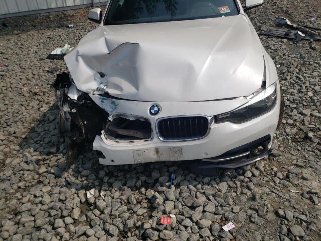 WBA8D9G3XHNU65764 BMW 330 XI