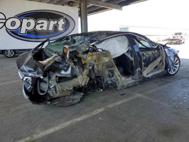 5YJ3E1EA2JF061083 Tesla 2018