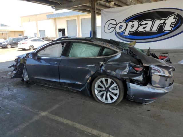 5YJ3E1EA2JF061083 Tesla 2018