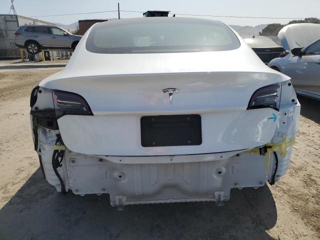 5YJ3E1EA9LF613066 Tesla 2020
