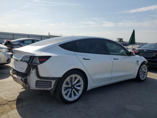 5YJ3E1EB0MF997183 Tesla 2021