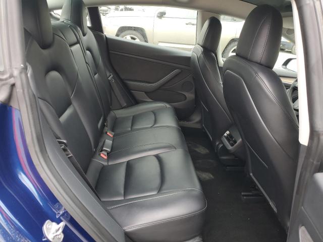 5YJ3E1EA7PF450973 Tesla 2023