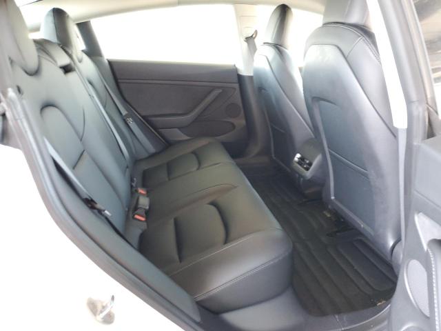 5YJ3E1EA6NF107360 Tesla 2022