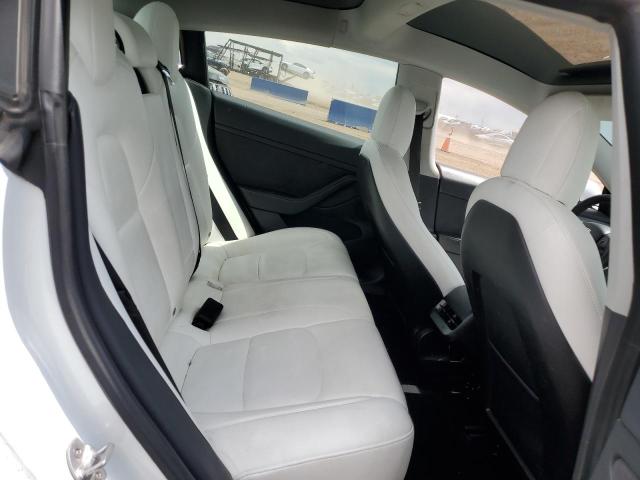 5YJ3E1EBXMF035702 Tesla 2021