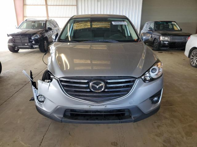 JM3KE2CY0G0882859 Mazda py
