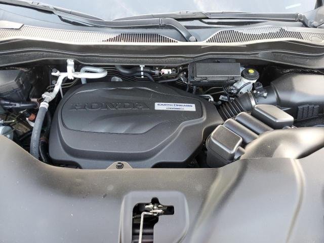 5FNYF7H22KB009898 Honda Passport Sport