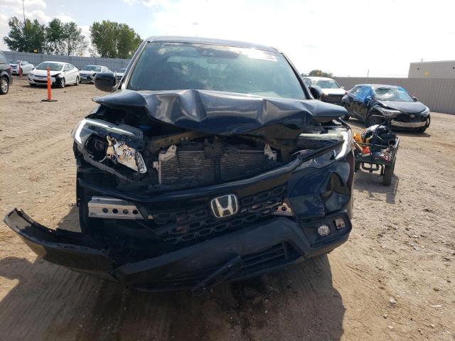 5FNYF8H29MB000477 Honda Passport Sport