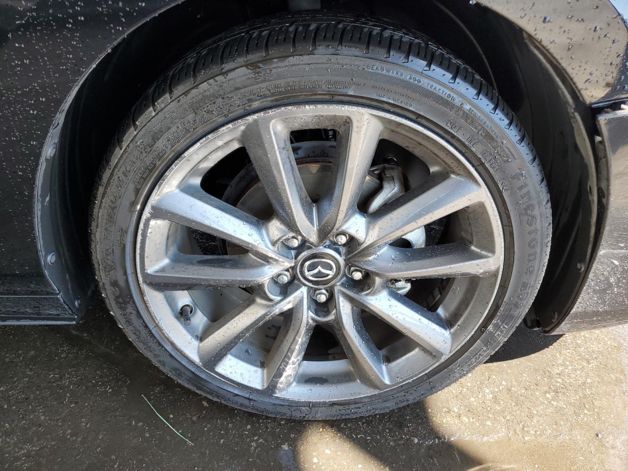 JM1BPAKL8M1337145 Mazda 3 SELECT