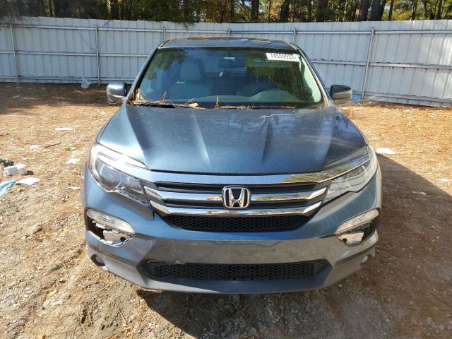 5FNYF5H57GB050825 Honda PILOT EXL