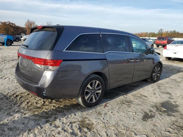 5FNRL5H94EB115658 Honda Odyssey Touring