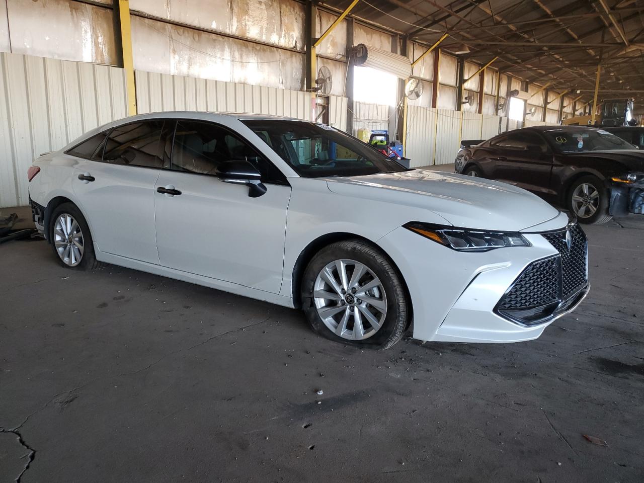 4T1EA1AB7NU011386 Toyota Avalon Nig