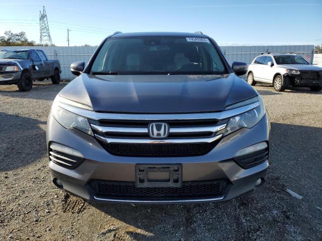 5FNYF6H04HB054603 Honda Pilot Elite