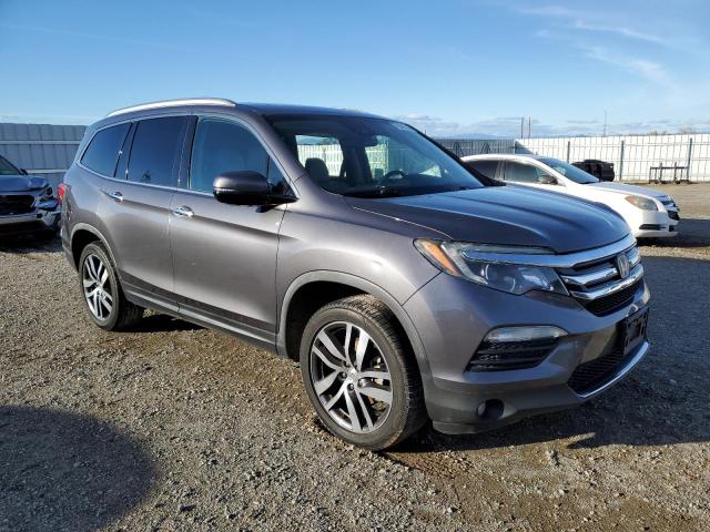 5FNYF6H04HB054603 Honda Pilot Elite